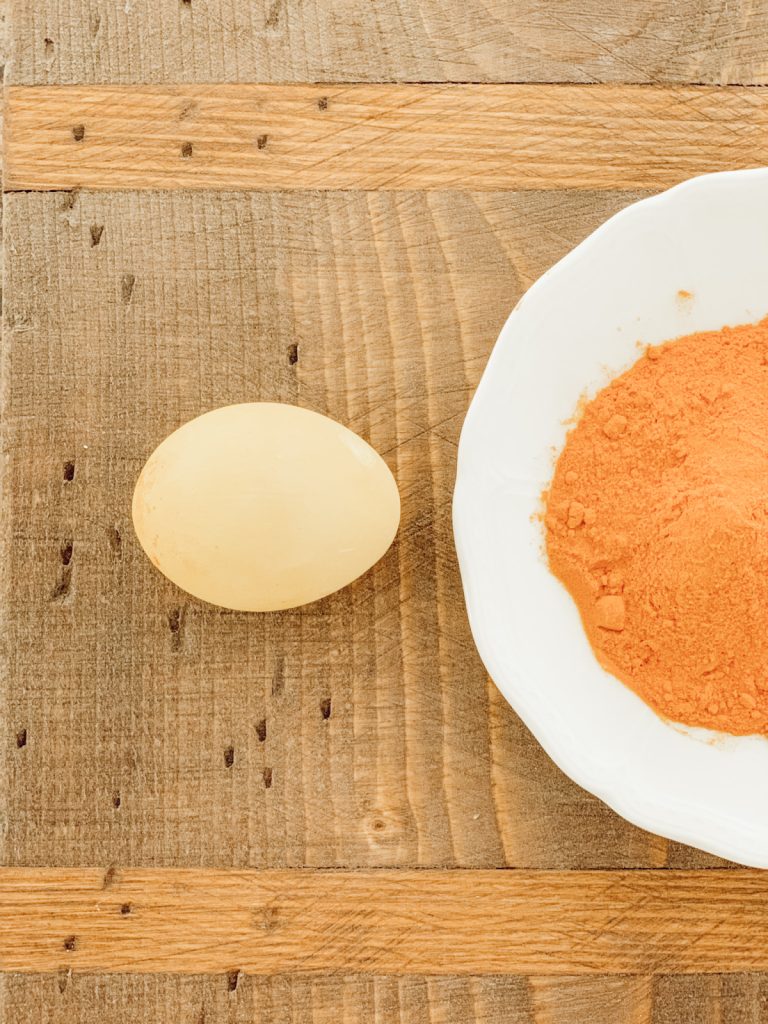 Naturally dye Easter eggs yellow with tumeric.
