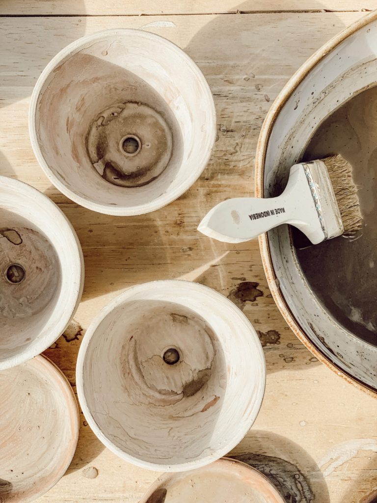 Aging terracotta pots is easy with lime & water and make the perfect Mother's Day gift.