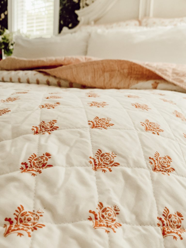 Summer bedroom refresh with a quilt and lightweight bedding.