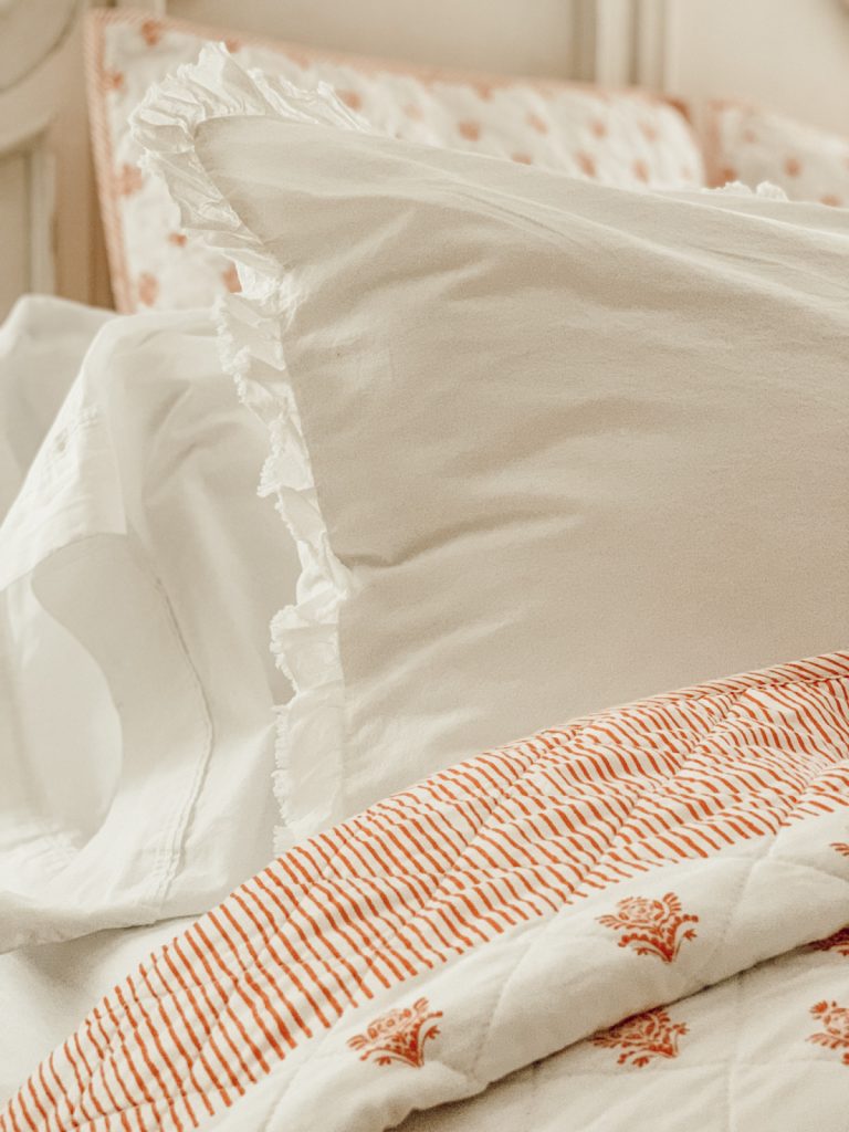 White cotton bedding is ideal for summer and hot nights.