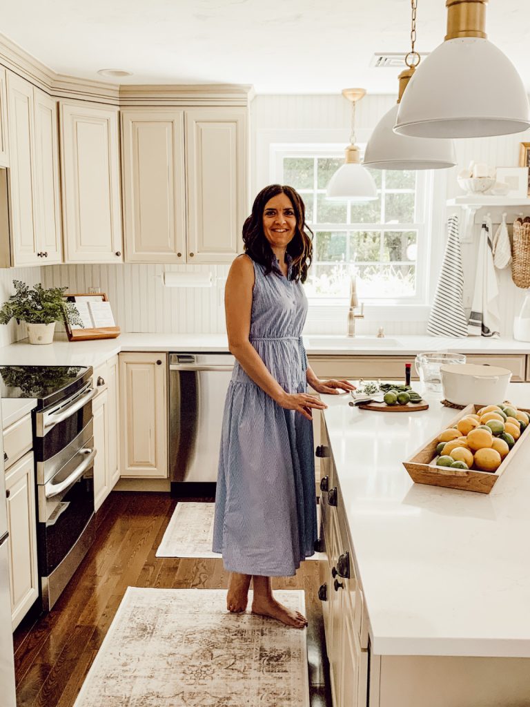 Farmhouse kitchen in summer with citrus fruit and herbs.