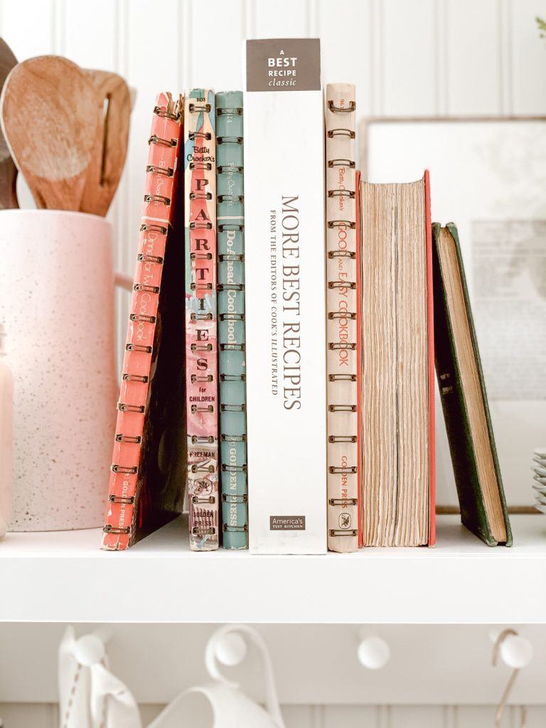 Cookbooks placed in the kitchen for country farmhouse decor.