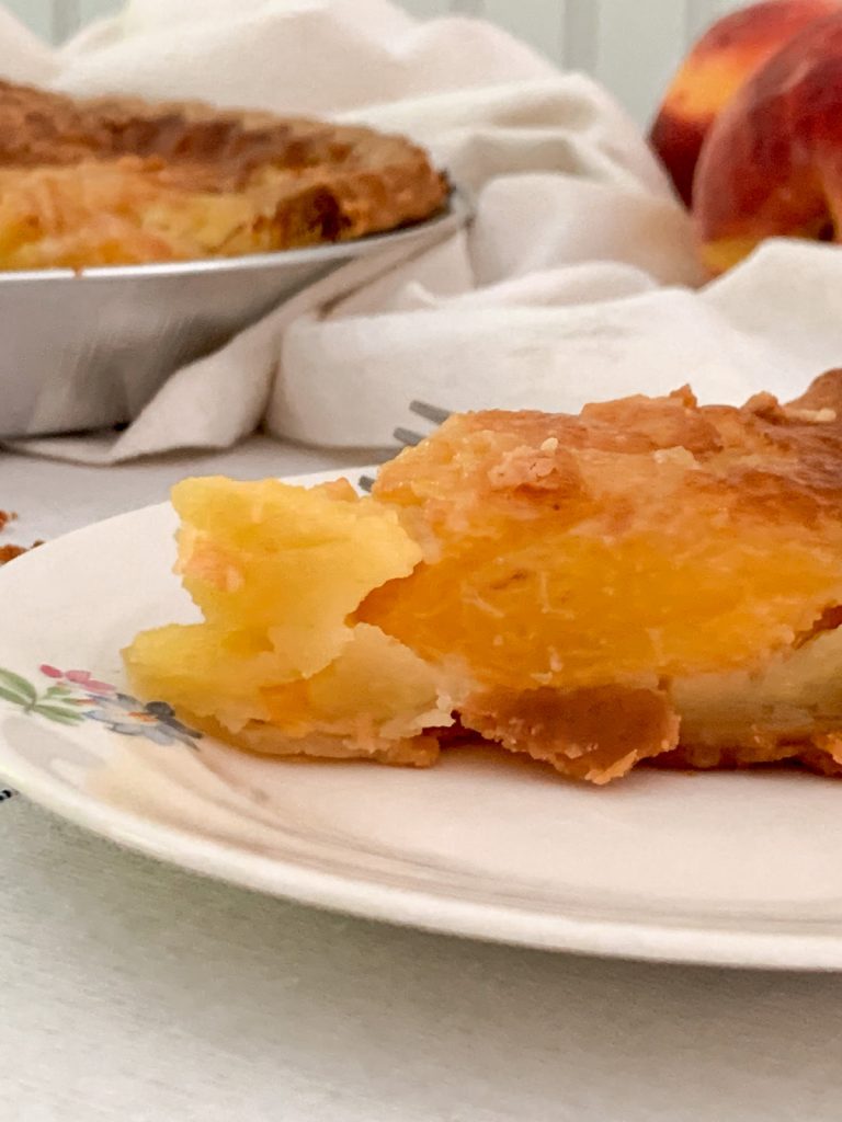 Fresh slice of pie for summer with seasonal fruit and pie crust.