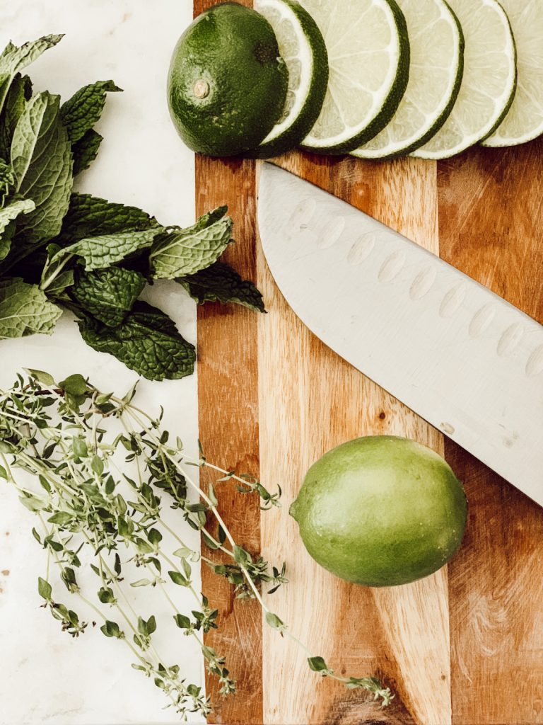 Sliced limes for a stovetop potpourri for summer.