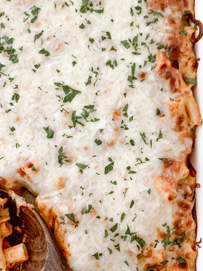 Quick & easy cheesy baked ziti casserole that will feed a crowd.