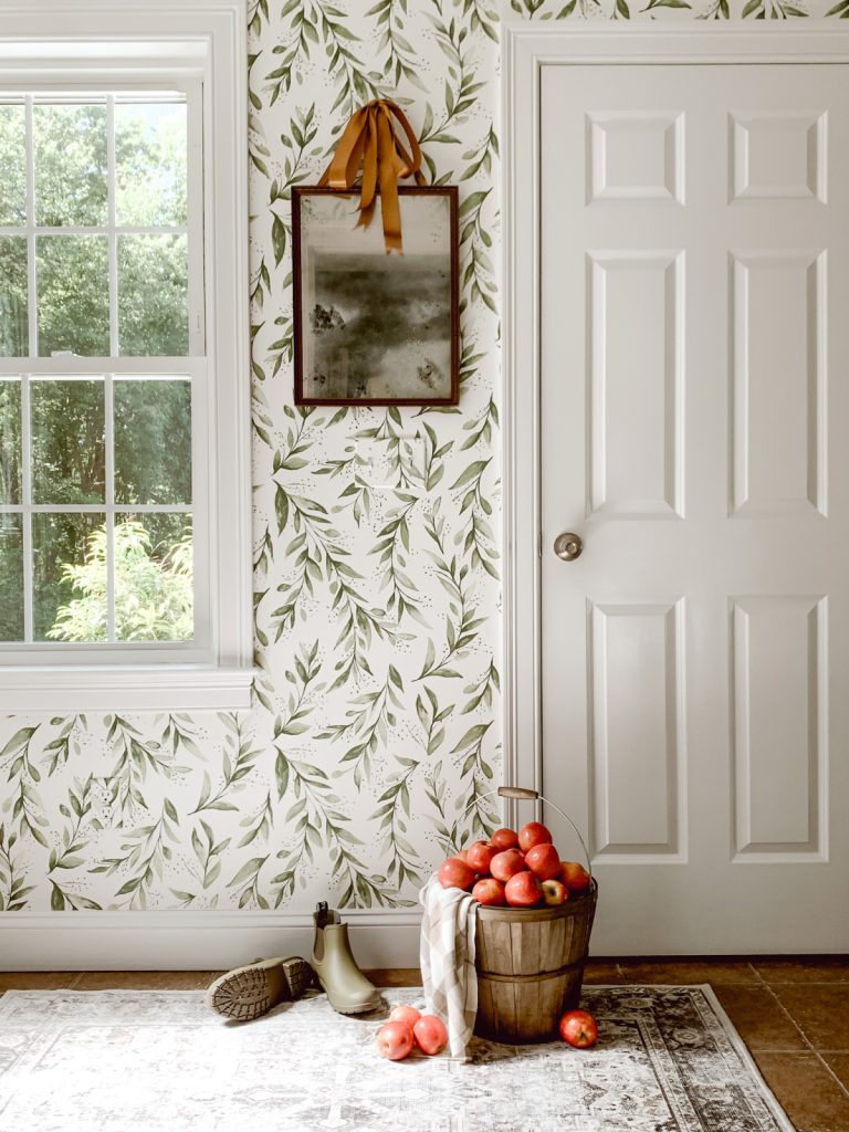 Hang a DIY mirror in a farmhouse entryway for an inviting way to welcome guests.