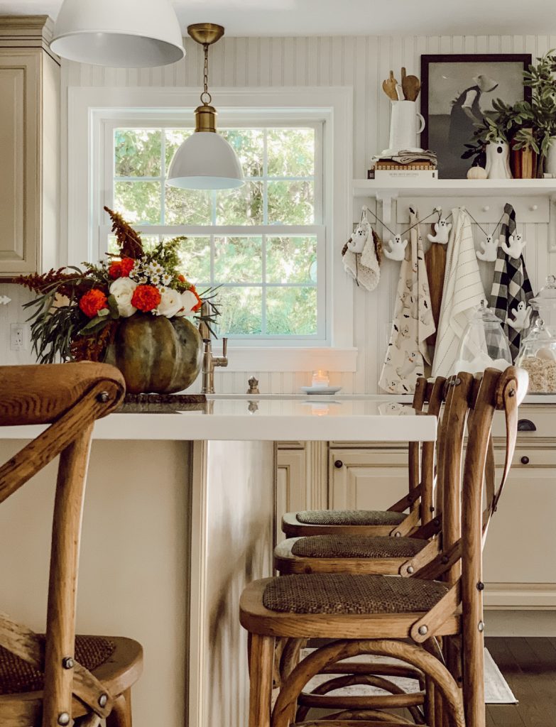 Farmhouse kitchen with heirloom pumpkin centerpiece.