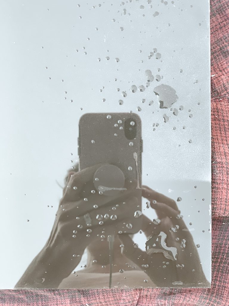 Drops of vinegar to antique a plain piece of glass.