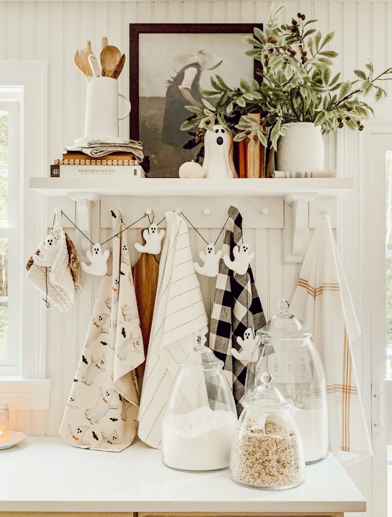 DIY halloween garland hanging in a farmhouse kitchen.