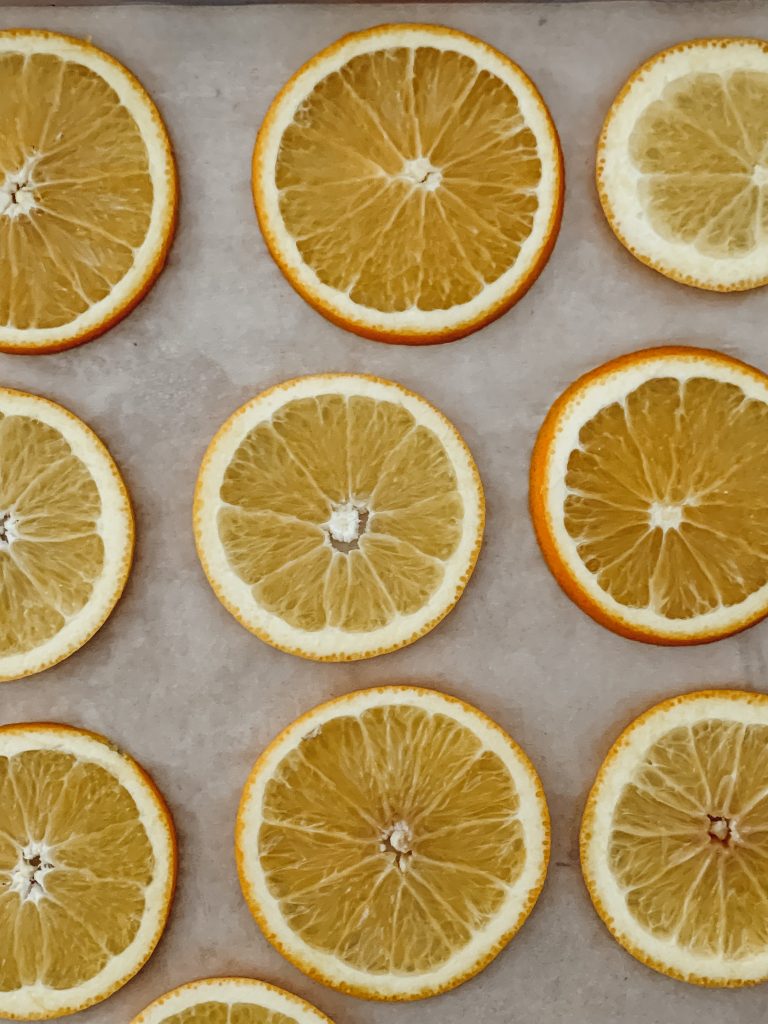 Oven dried citrus fruit that can be used as natural elements in home decor.