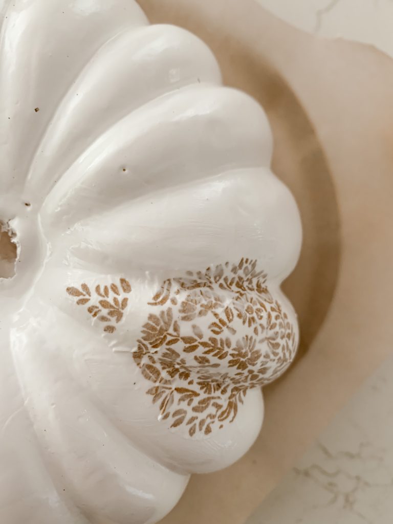 Mod Podge the paper napkin onto the foam pumpkin.