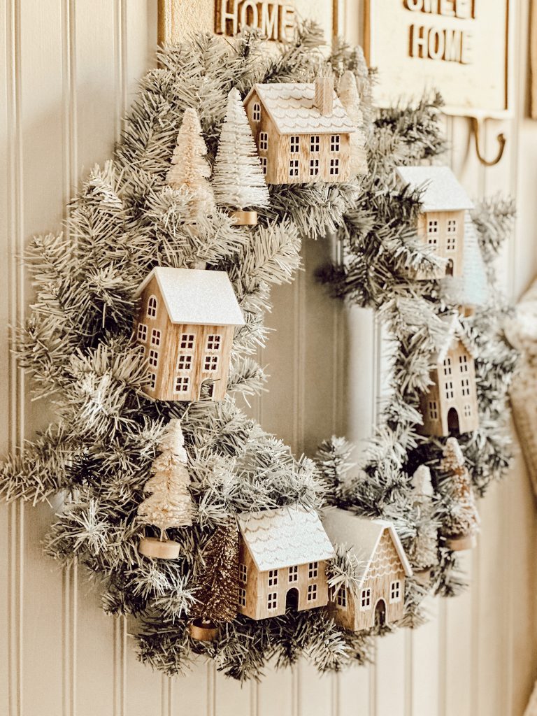 DIY Christmas village Anthropologie dupe wreath for the holidays.