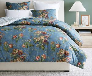 Blue floral comforter for a cottage farmhouse bedroom.