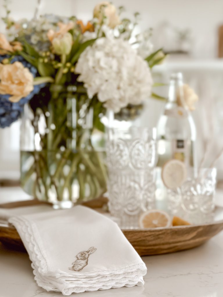 Budget friendly easter home decor with DIY stamped Easter napkins.