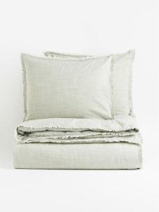 Green melange duvet for spring is perfect for refreshing a bedroom.