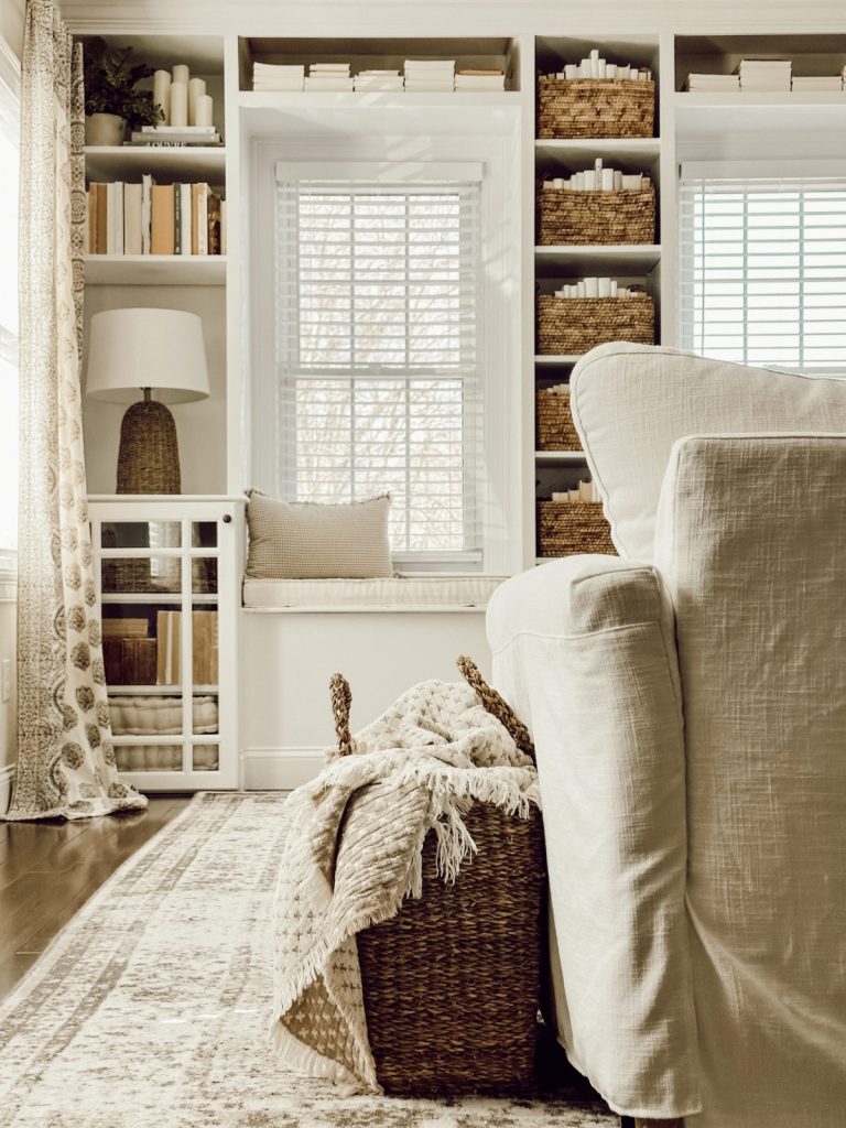 Built-in bookshelves styled for a spring home tour.