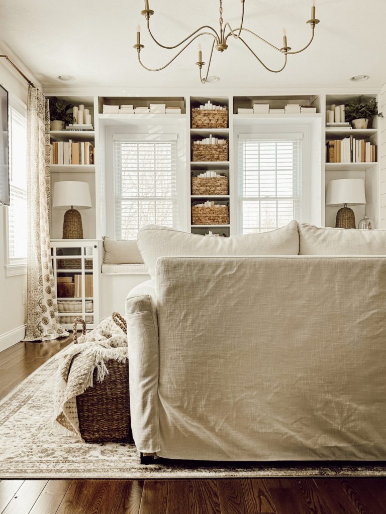 Cottage farmhouse family room with neutral spring decor.