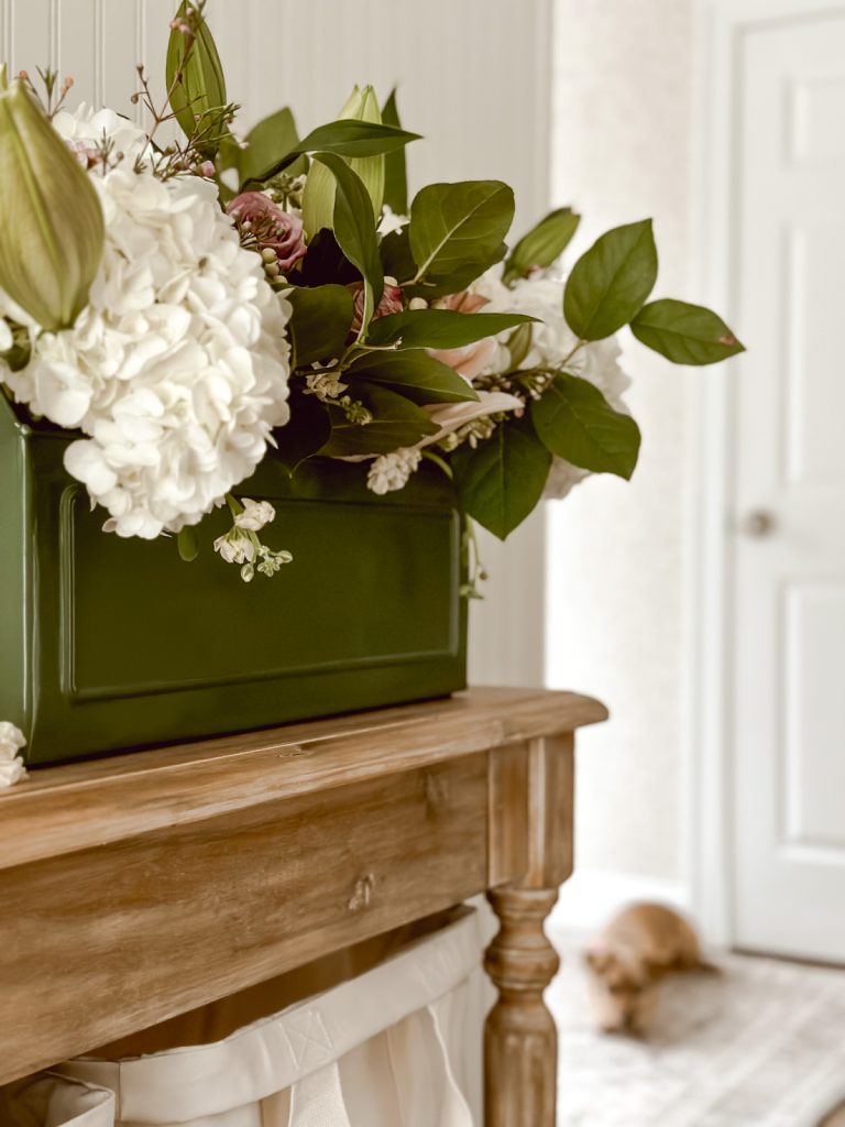 Garden caddy arrangement in cottage farmhouse kitchen.