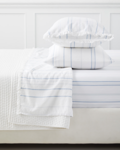 Soft & cozy striped cotton sheets in a cottage farmhouse bedroom.