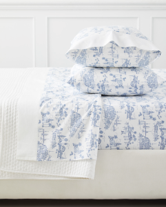 Toile sheets add pattern & coziness to a spring bedroom.