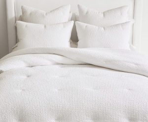 Cozy neutral spring bedding that is fresh & new for spring.