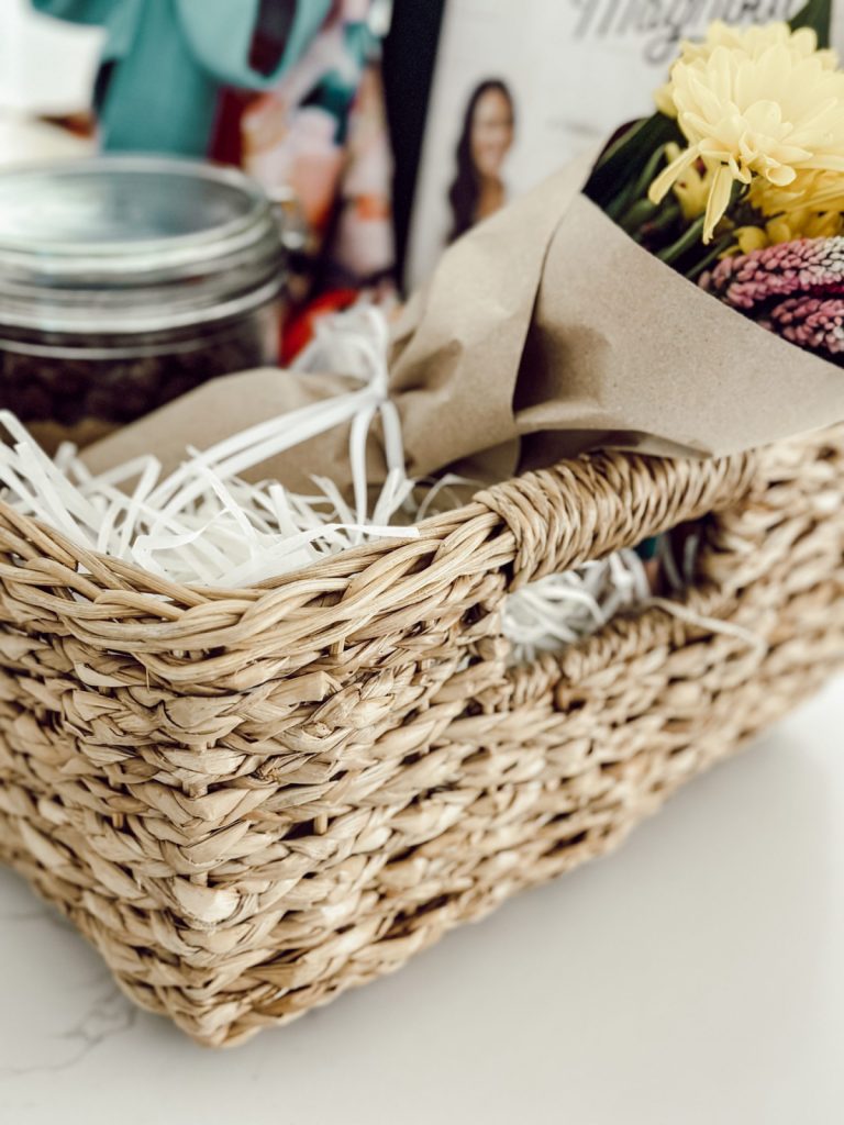 A country basket with handles is perfect for this Mother's Day gift basket.