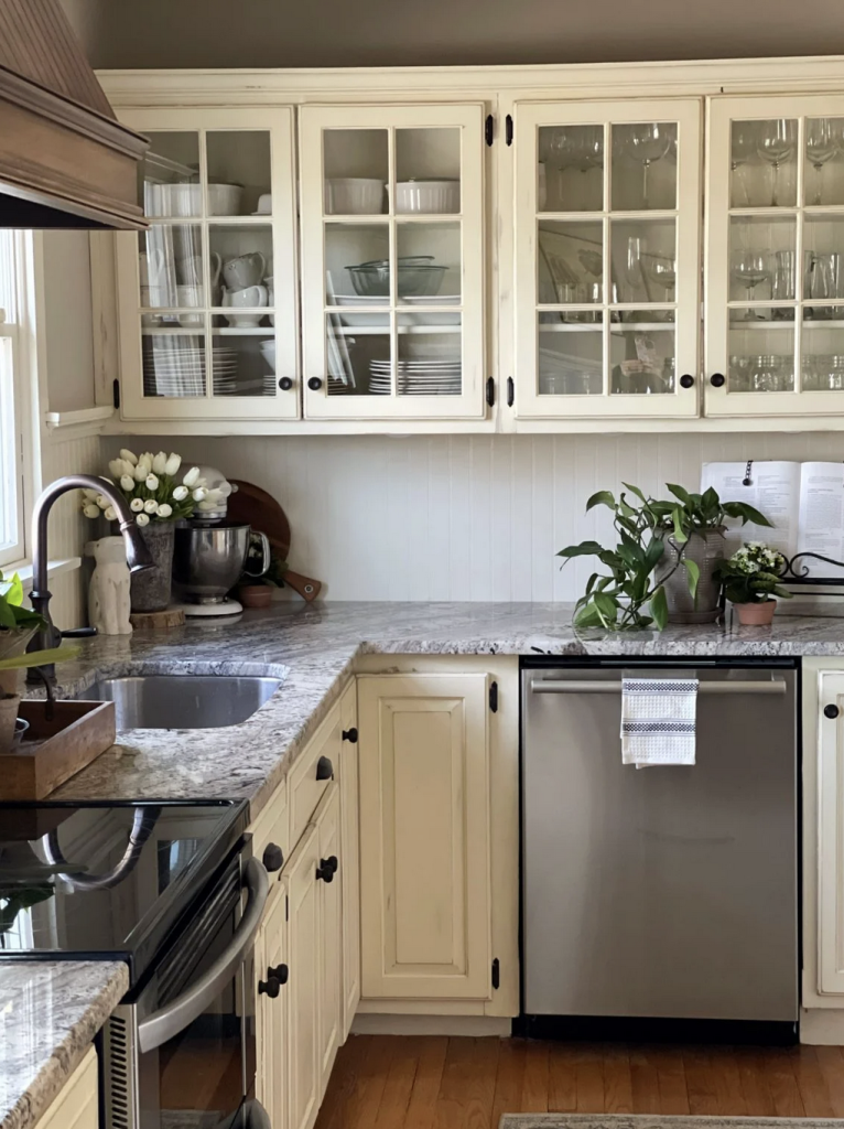 Country cottage kitchen with chalk painted cabinets.