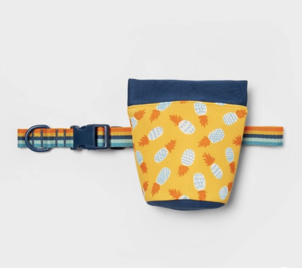 Convenient pet treat holder that attaches to dog or cat leash.