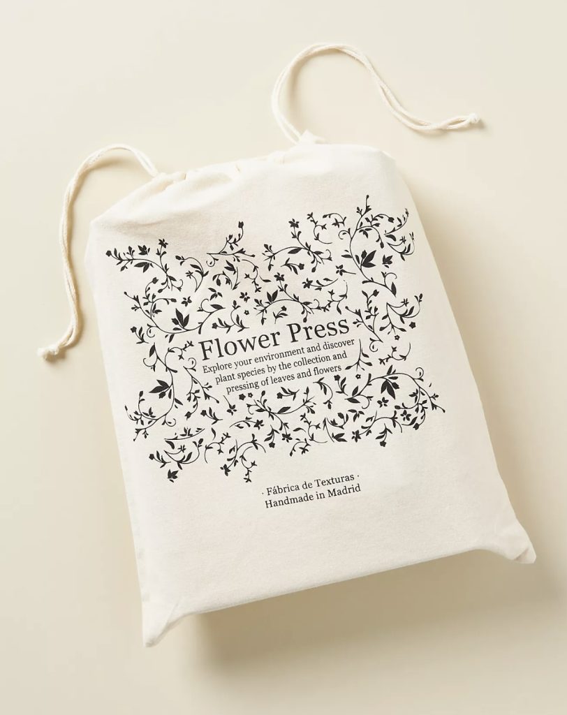 A flower press kit from Anthropologie is a fun way to preserve flowers.