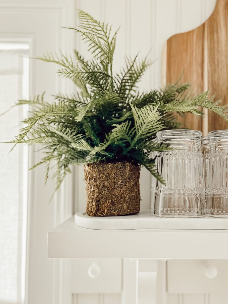 Greenery in a cottage farmhouse kitchen for spring.