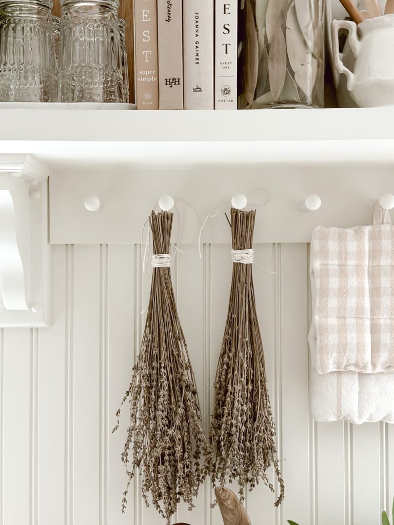 Hanging dried lavender in a cottage kitchen is a perfect spring decorating idea.