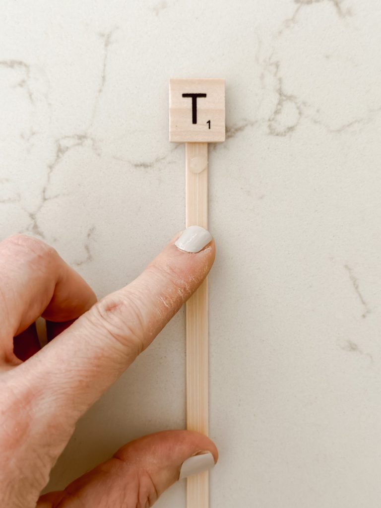 Easy to make herb markers with Scrabble tiles & bamboo sticks.