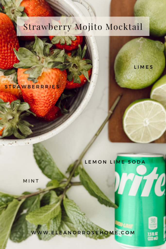 Ingredients for a mojito mocktail include strawberries, limes, mint, & lemon lime soda.