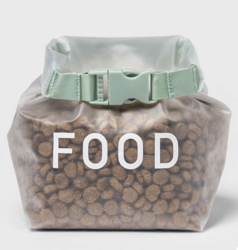 Pet food holder with a buckle closure. 