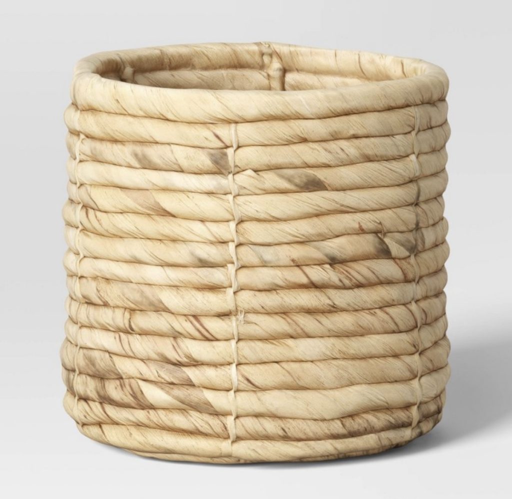 Woven outdoor planter for mom to plant her plants inside.