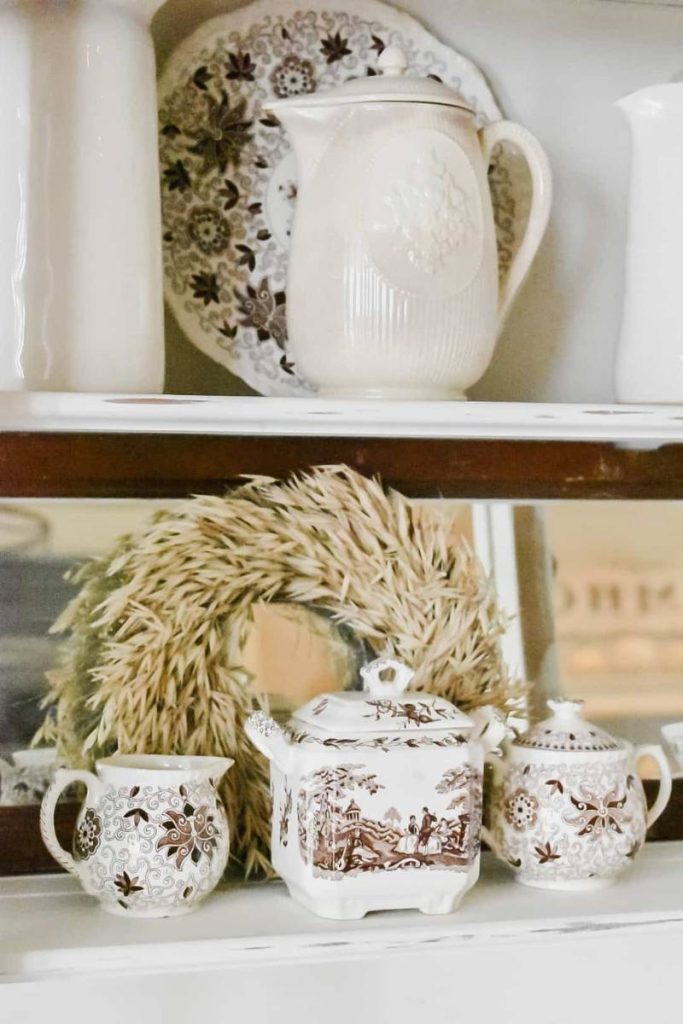 DIY Kitchen decor on a vintage cottage style hutch.