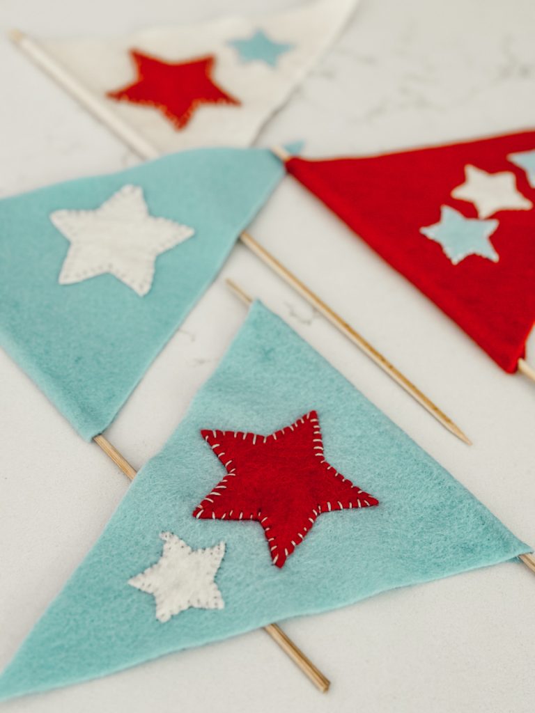 Patriotic flags for summer made with felt & bamboo skewers.