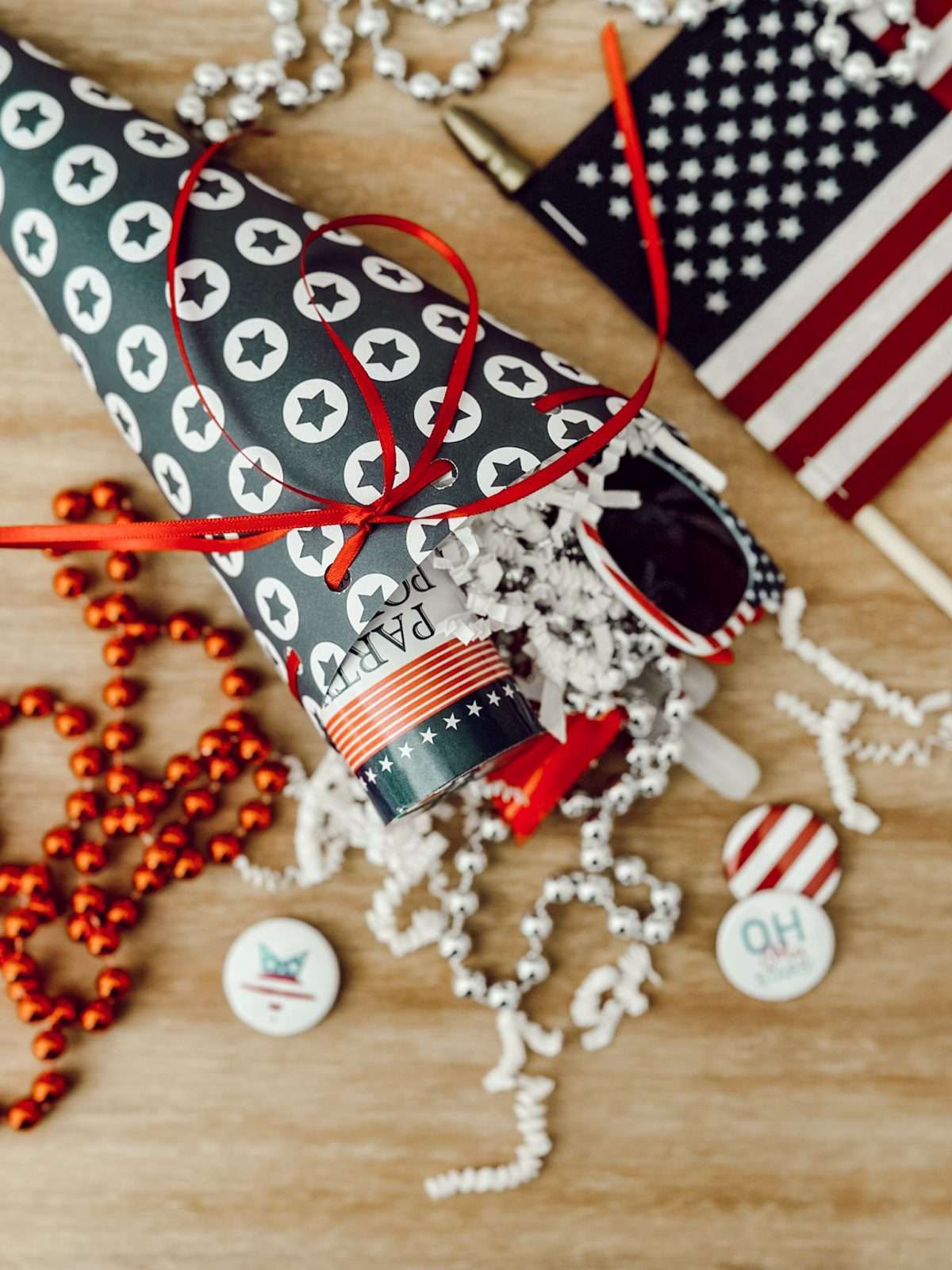 Patriotic party favors for 4th of July celebrations made with a paper cone and patriotic themed goodies.