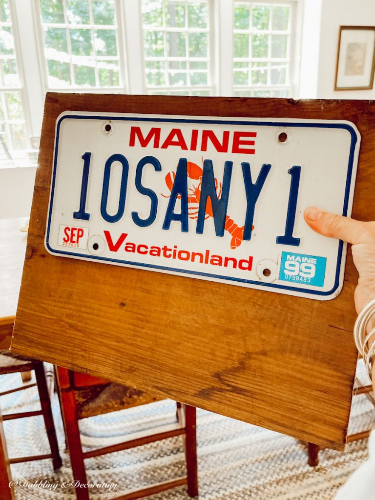 Summer DIY decor with vintage license plates and wood.