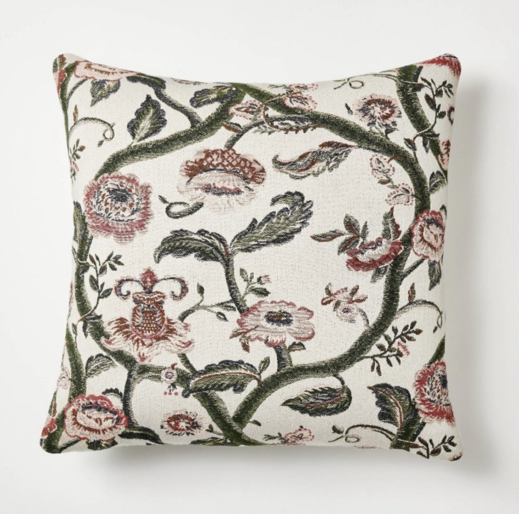 Square floral throw pillow for a cottage farmhouse living room.