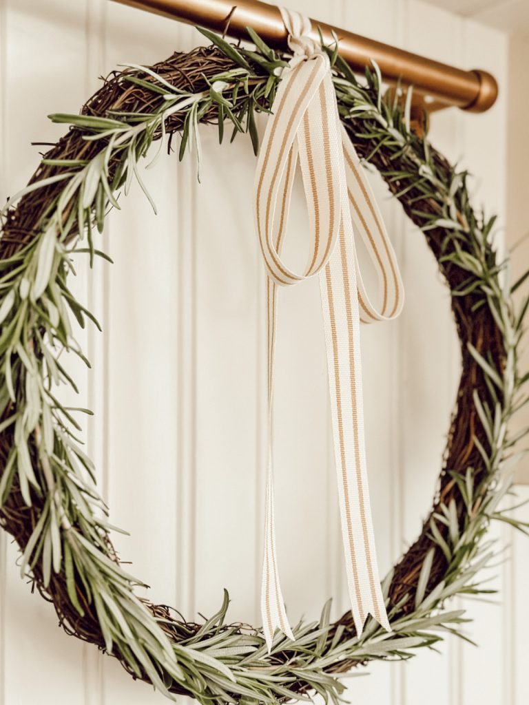 Fresh rosemary wreath with rosemary stems in the shape of a circle.