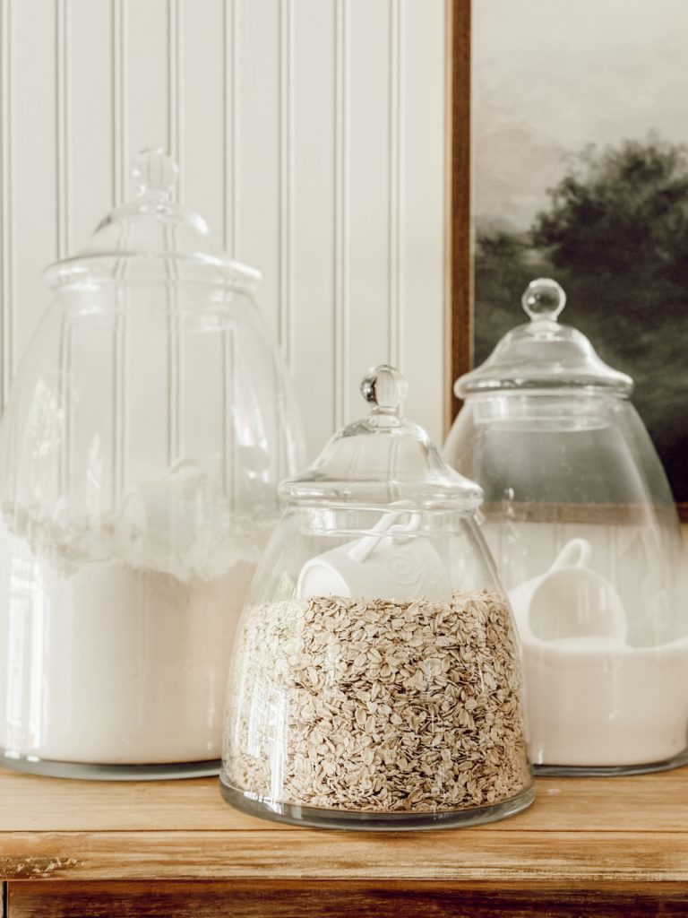 Kitchen canisters are ideal functional kitchen decor for holding baking supplies.