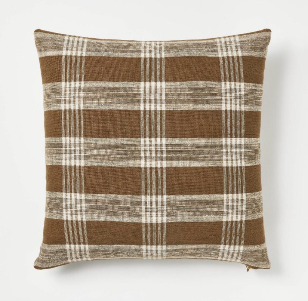 Brown and cream plaid throw pillow for a farmhouse living room.