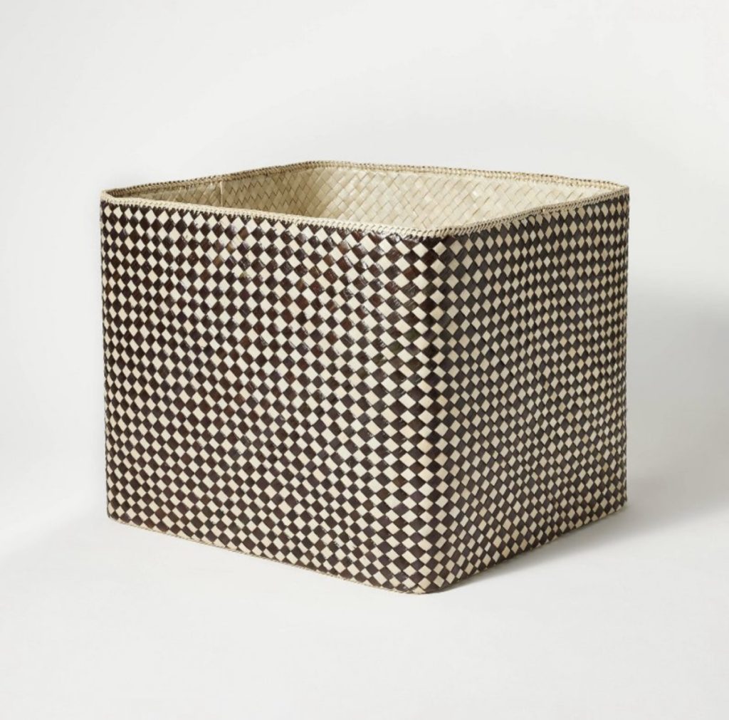 Cube storage bin for storing items away in a closet.