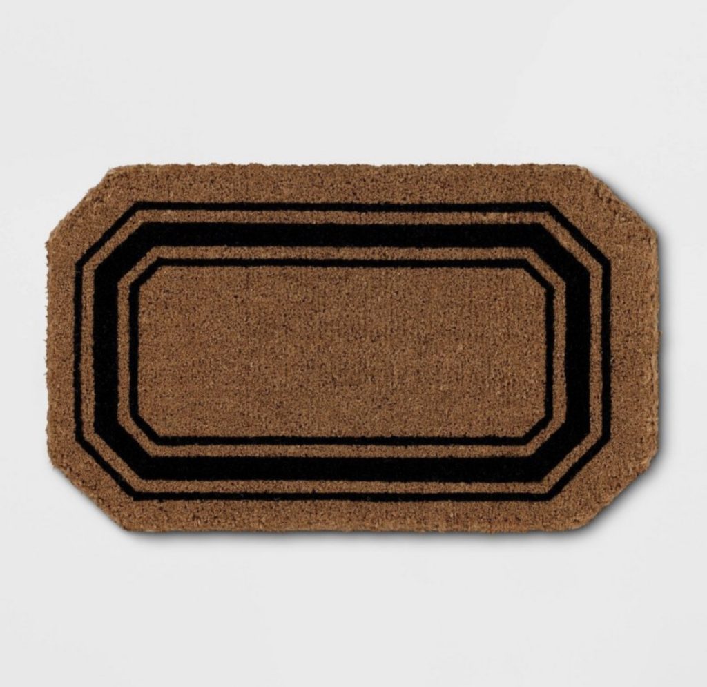 Coir striped welcome door mat for the front door.