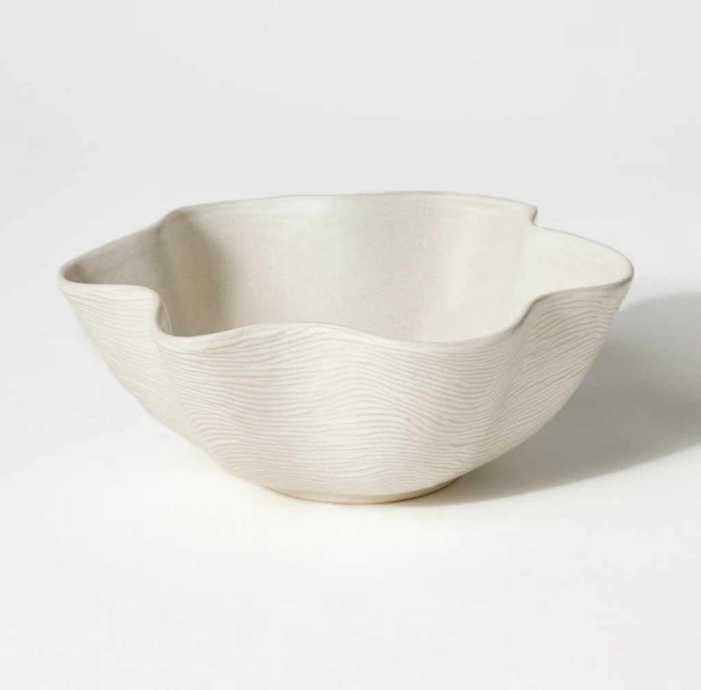 White scalloped bowl for home decoration in any room.