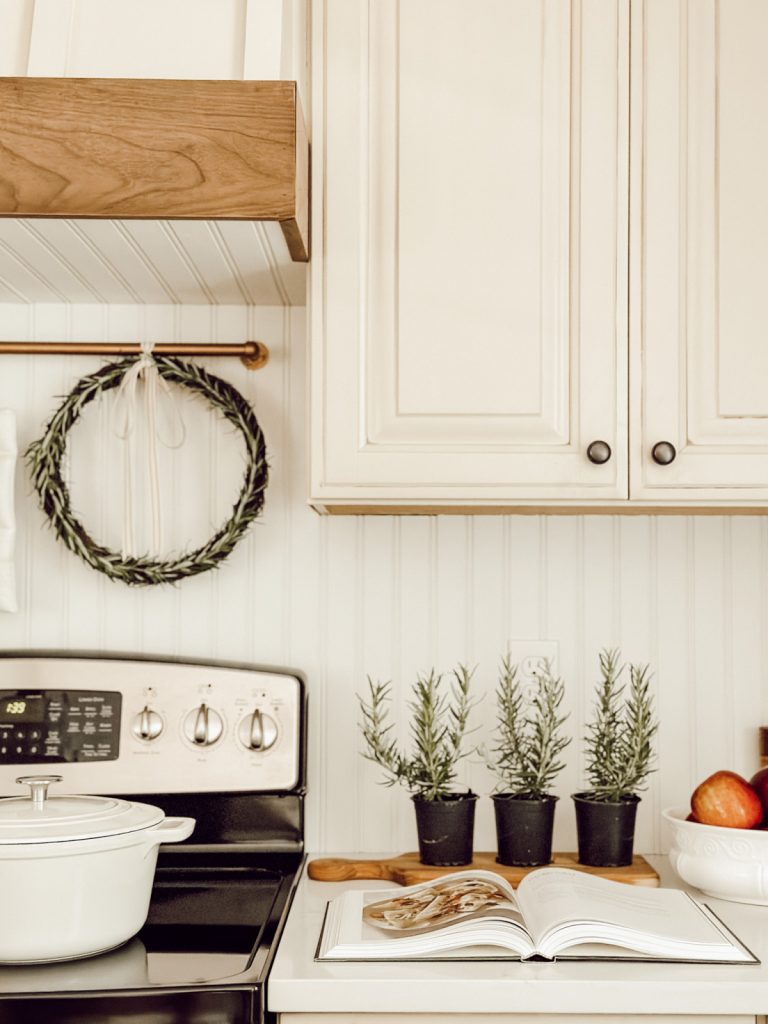 Natural decor hanging behind the stove in the kitchen.
