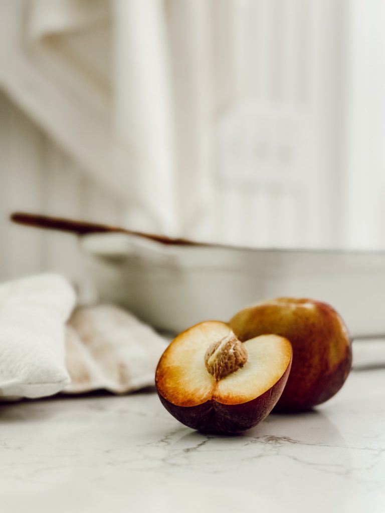 Peach bread pudding dessert with croissants and buttermilk.