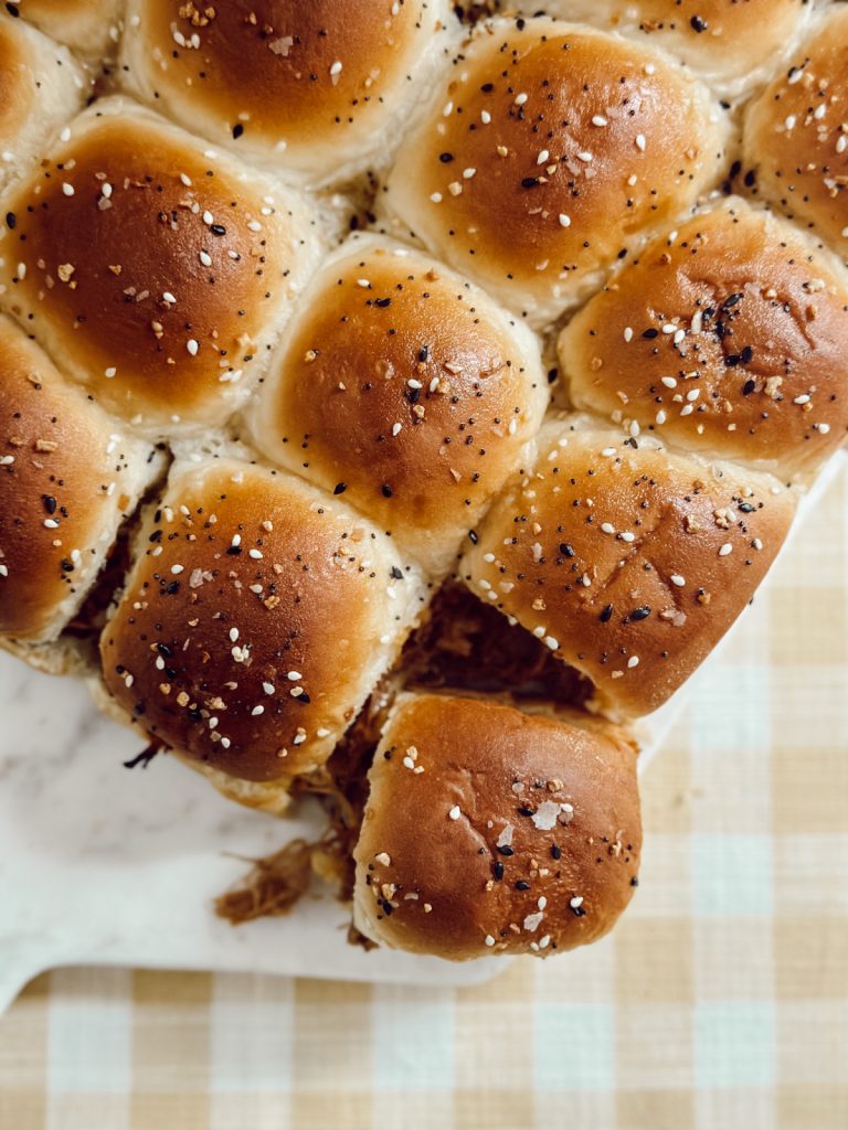 Barbecue pulled pork sliders are the perfect summer cookout food.
