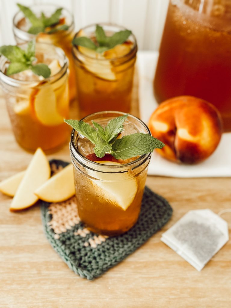 Sweet summer beverage with fresh fruit and black tea. 